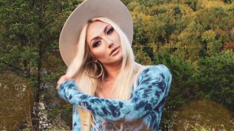 Brooke Hogan in a bikini and in a leopard-print dress.