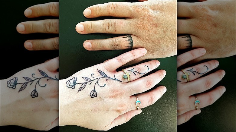 couple wearing wedding ring tattoos