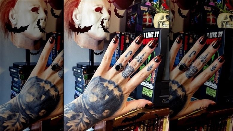 woman with wedding ring tattoos