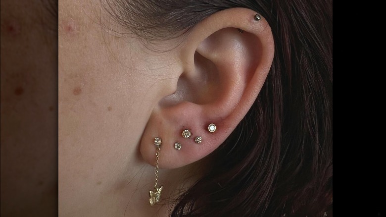 Closeup of constellation piercings