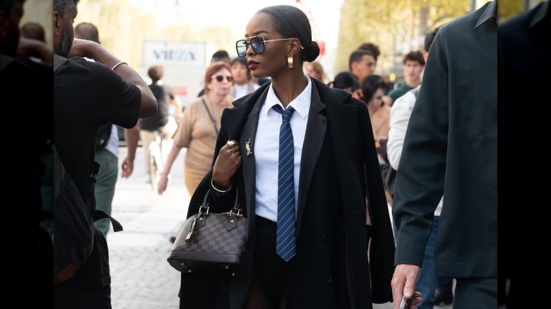 woman wearing black and white outfit