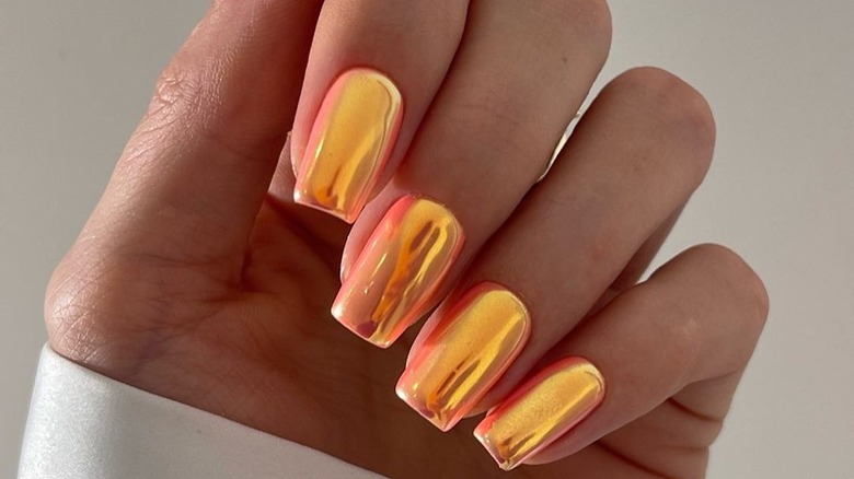 Coral chrome manicure