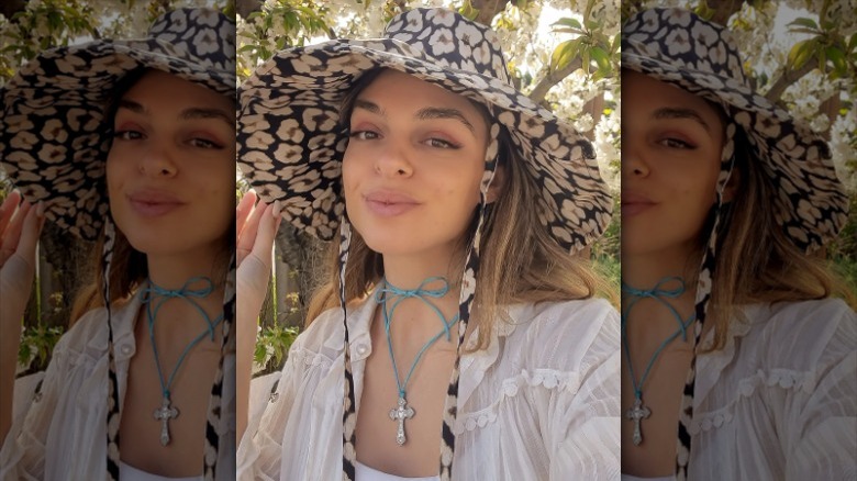 Blue cord necklace with cross pendant