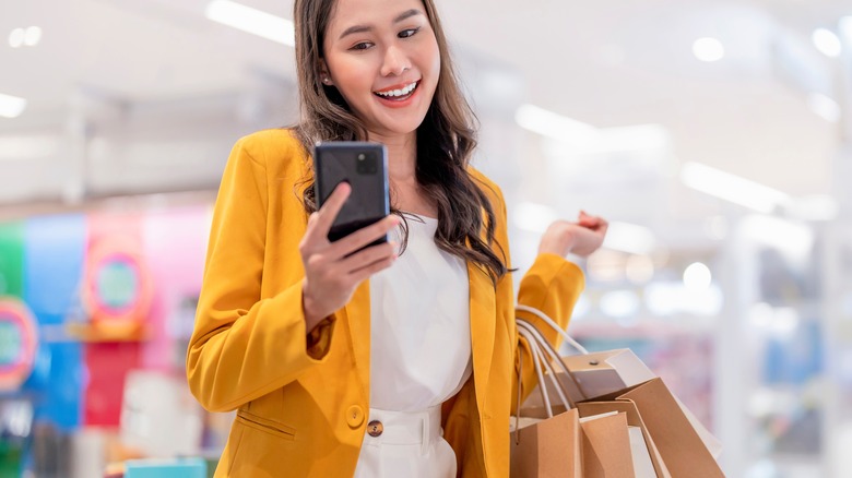 woman shopping holding bags
