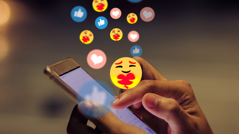 person interacting on social apps