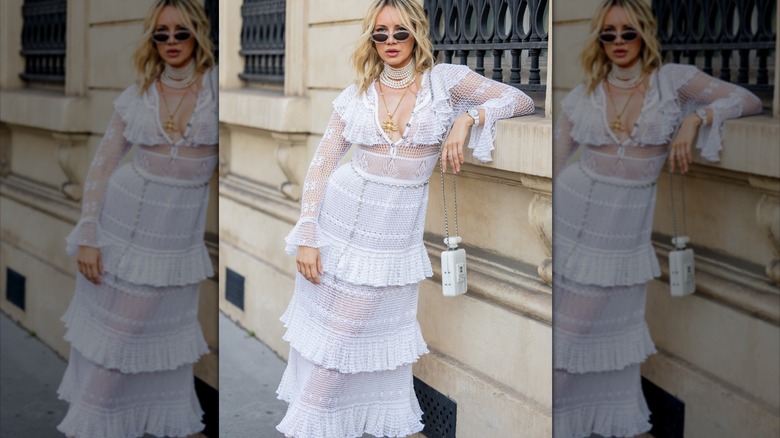 woman wearing white embroidered dress