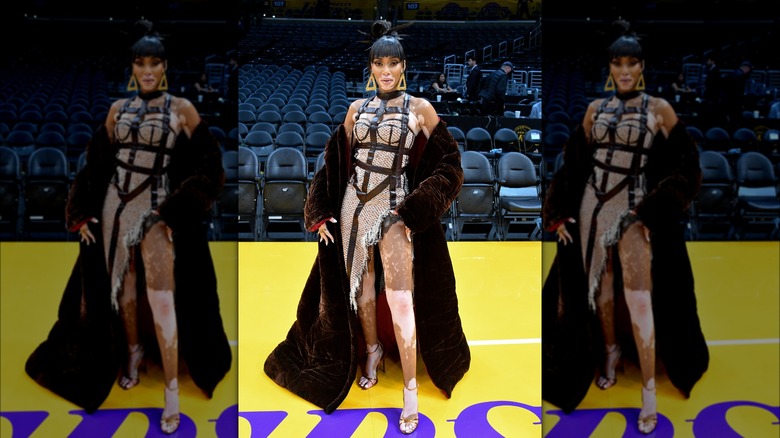 Winnie Harlow fur coat cage dress