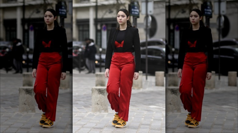 red bralette over black top