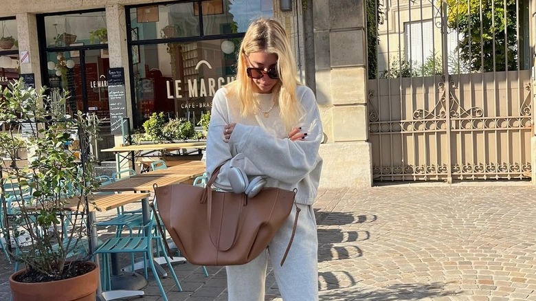Woman carrying big tote bag