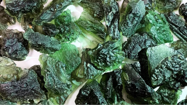 group of Moldavite crystals on white background