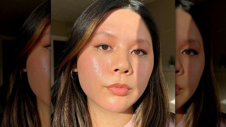 A woman with face jewels