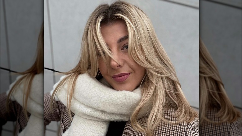 Woman with curve bangs