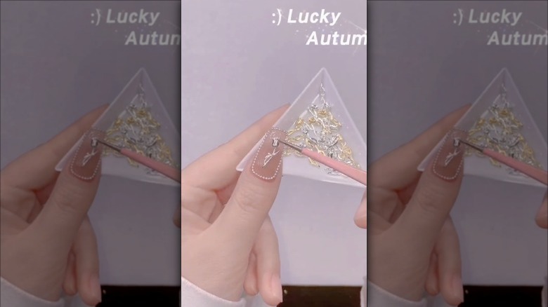 Applying cuticle pearl chain to nails