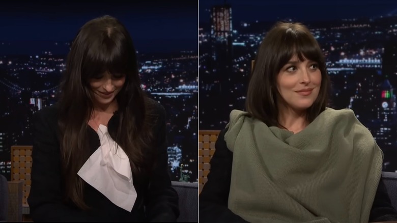 Dakota Johnson covering up her dress