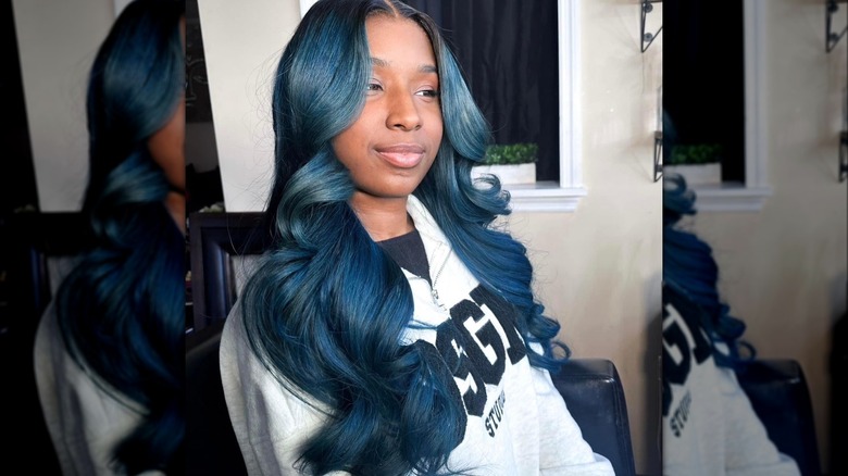 Woman with navy velvet hair