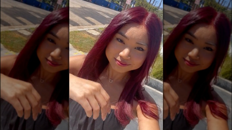 Woman with burgundy velvet hair