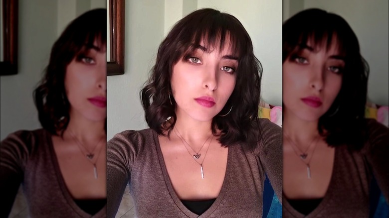 Woman with dark brown velvet hair