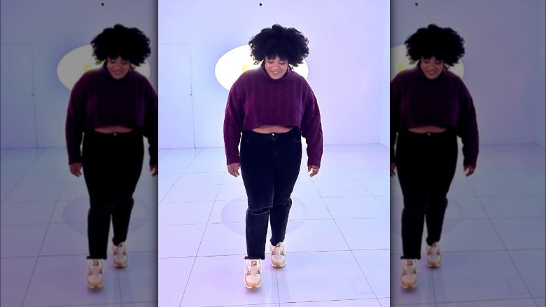 Woman wearing top with jeans