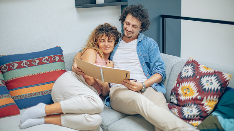 couple looking at photo album