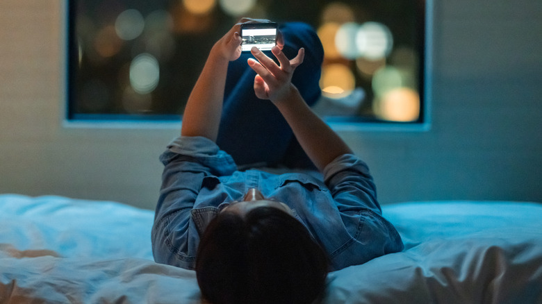 woman using dating app