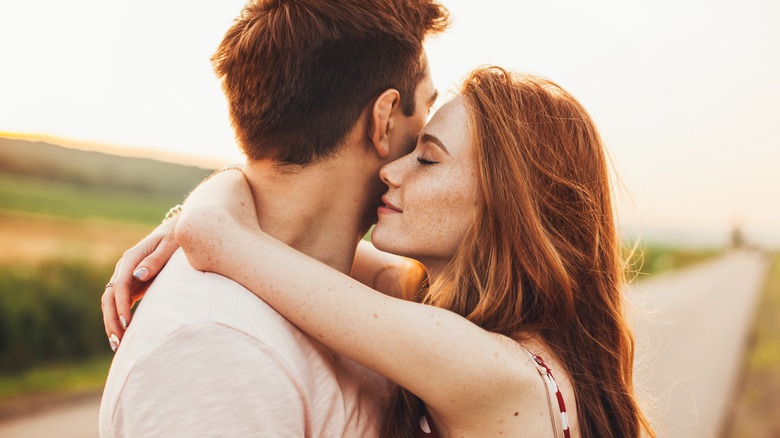 happy couple hugging