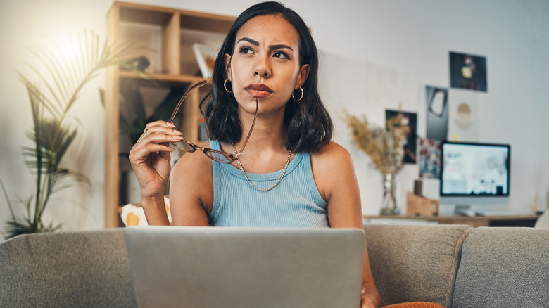 Woman staring off in thought