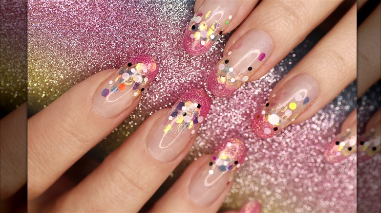 Manicure with pink sparkle polish