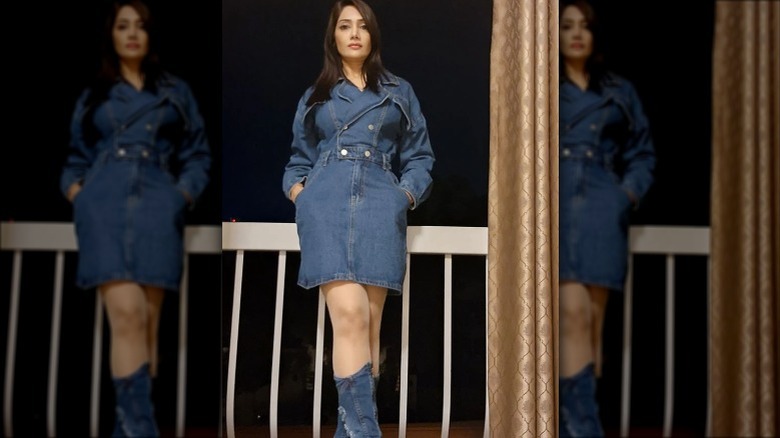 Woman in denim dress, boots