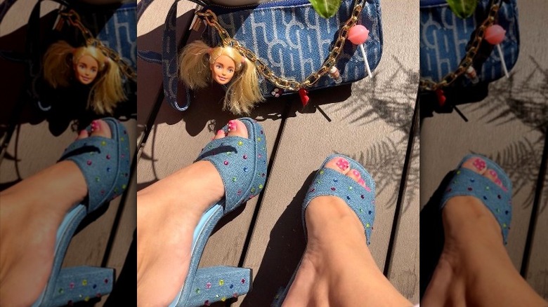 close up of denim mule heels