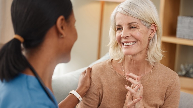 Woman talks with doctor