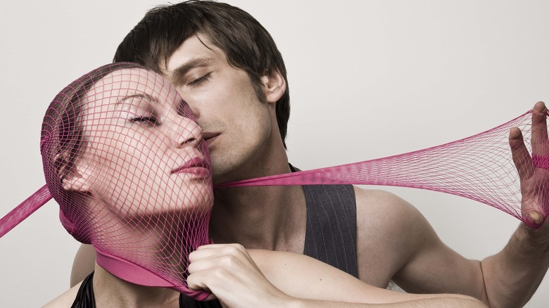 woman with fishnets on head