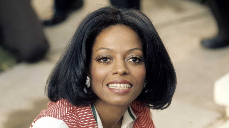 Diana Ross smiling in 1973 with a bob haircut.