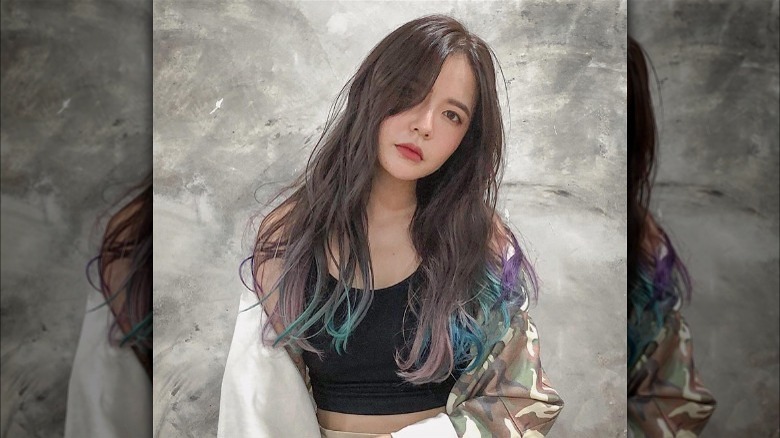 Long brunette hair with teal and pink dip dye