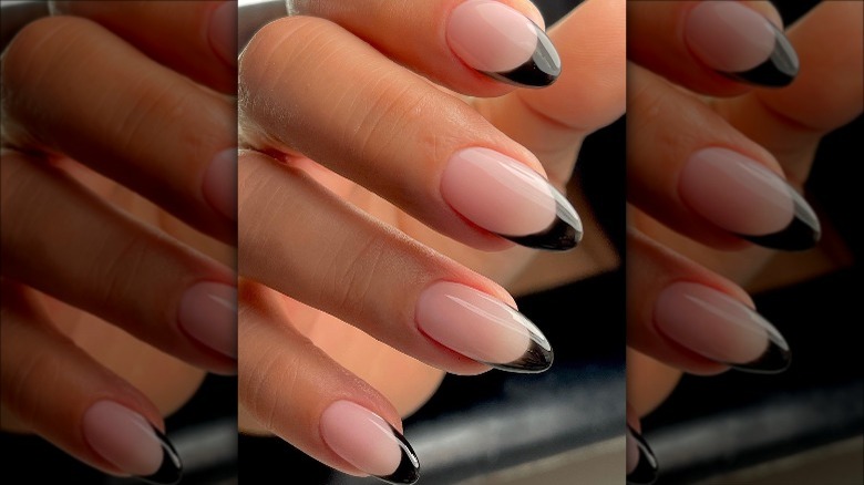 black tips dip powder manicure