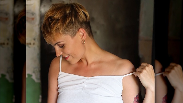 Woman models short layered disconnected cuts