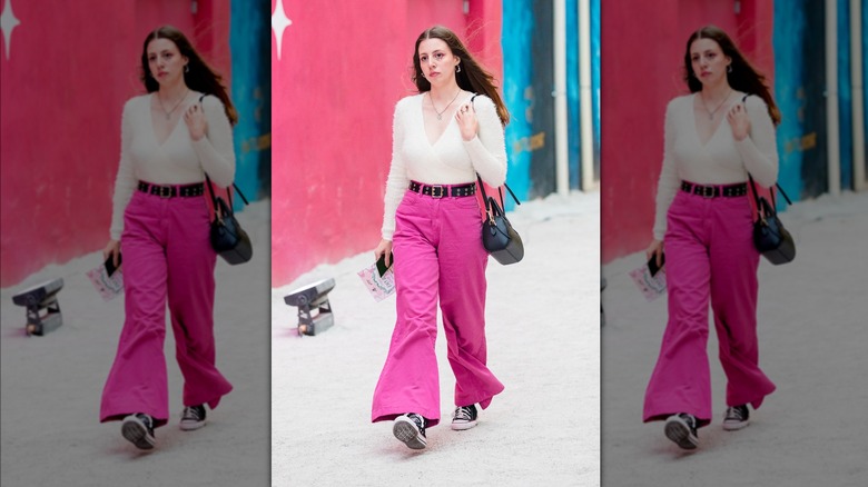 Woman wearing pink jeans