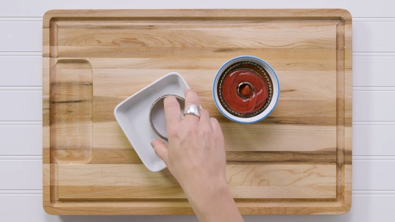 Jewelry submerged in ketchup