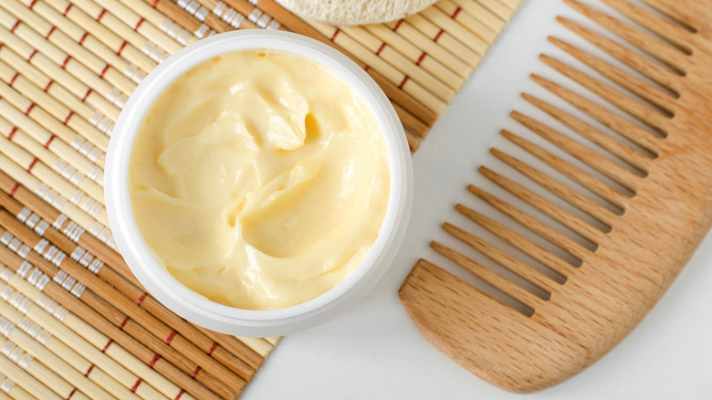 Yellow hair mask with wooden comb