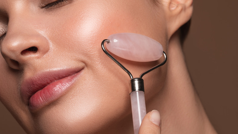 woman using quartz roller