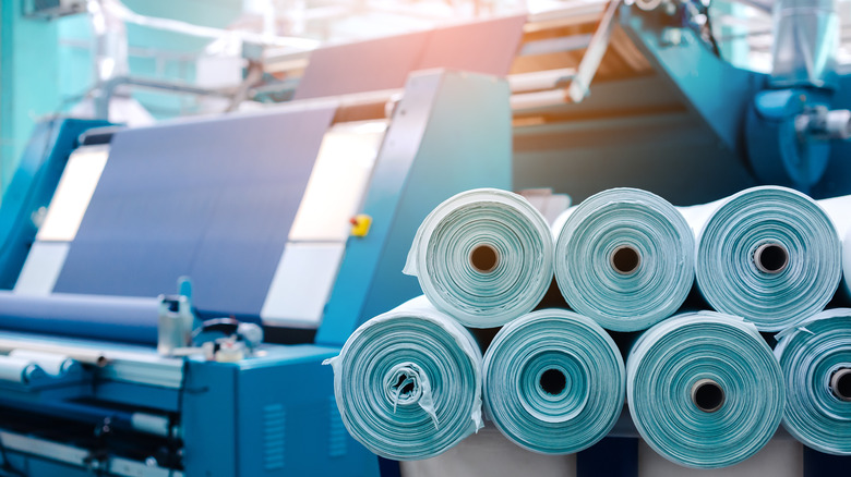 spools of blue fabric