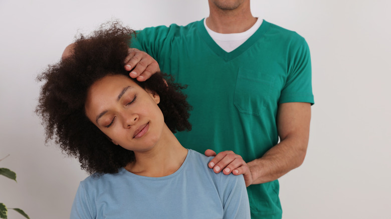 Woman having adjustment done