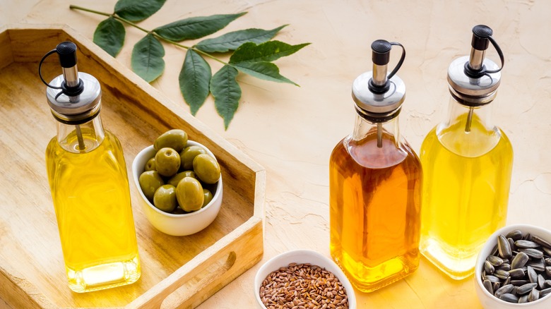 Olive oil poured into bowls.