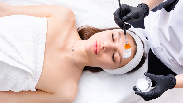 woman receiving chemical peel