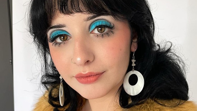 woman with doll lashes