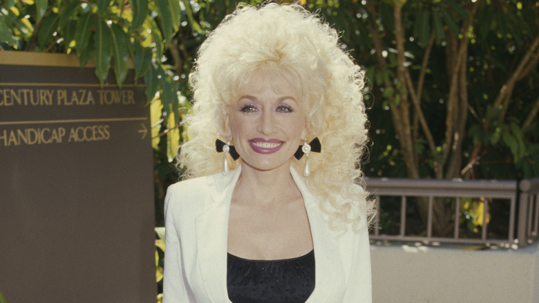 Dolly Parton with long, curly hair