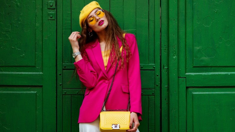 woman in pink blazer