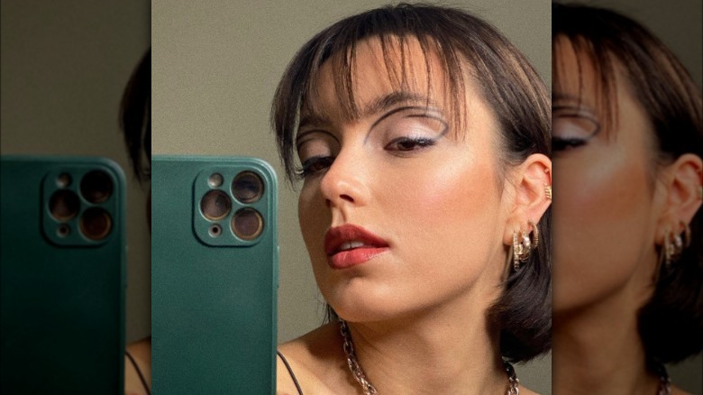 A woman with round cut-crease eyeliner