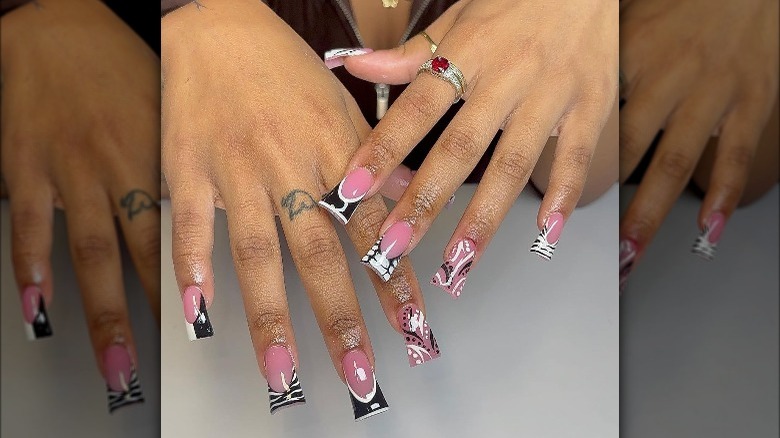 Black and white French tip duck nails 