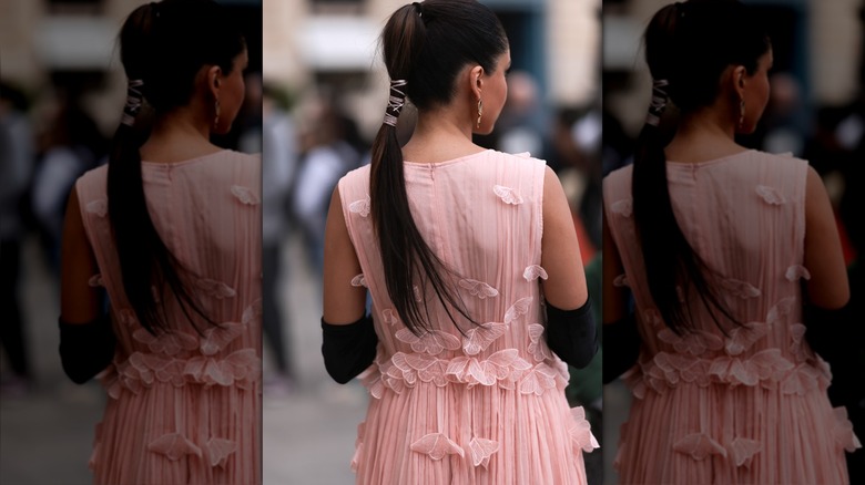 Woman wearing gauzy blush dress