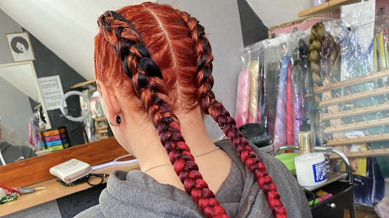 Woman with red braided hair 